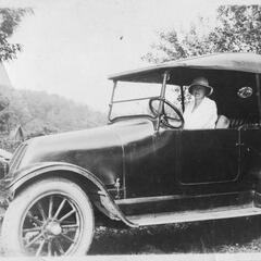 Gladys in a roadster